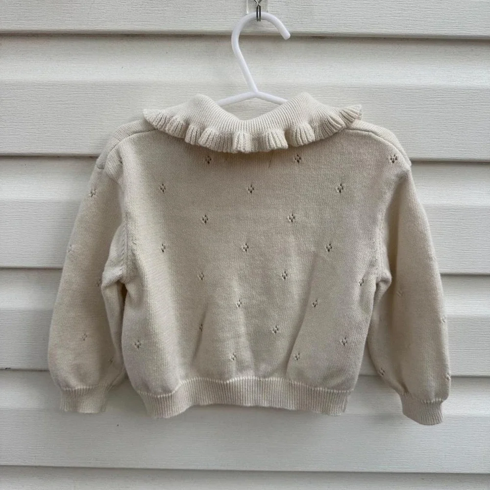 H&M cream knit set with small diamond-shaped embroidery and Peter Pan collar